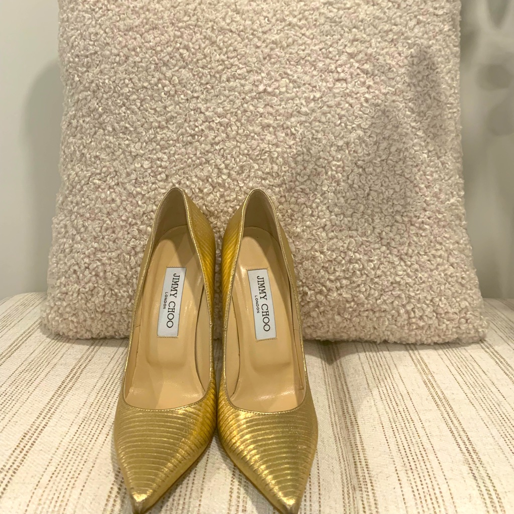 Gold Jimmy Choo Pumps.